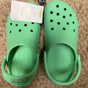 Crocs! Men’s size 6 and women’s 8. Turquoise. NWT.